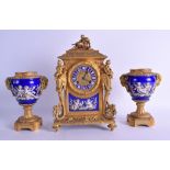 A GOOD MID 19TH CENTURY FRENCH ORMOLU AND PORCELAIN CLOCK GARNITURE painted with putti within