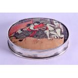 A SILVER AND ENAMEL 'EROTIC' PILL BOX. 6 cm wide.