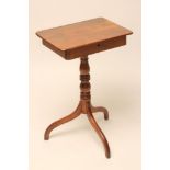 A GEORGIAN MAHOGANY OCCASIONAL TABLE, early 19th century, the rounded oblong top with fitted