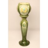 A BURMANTOFTS "FAIENCE" JARDINIERE AND STAND, c.1900, of baluster form with four reeded lug handles,