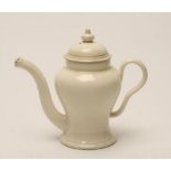 A CREAMWARE ROSEWATER SPRINKLER AND COVER, c.1780, of inverted baluster form, the slender curved