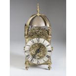 AN ENGLISH BRASS HOOK AND SPIKE LANTERN CLOCK, c.1700, the twin train movement with verge