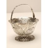 A LATE VICTORIAN SILVER BASKET retailed by William Moering, London import marks 1894, with diaper