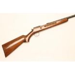 A .410 BOLT ACTION SHOTGUN, with 25 3/4" sighted barrel, bolt twist safety function, and walnut half