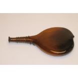 A DARK AMBER GLASS "SADDLE" FLASK, 19th century, of flattened tear drop form, the long neck with