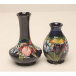 TWO MOORCROFT POTTERY SMALL VASES, late 20th century, one of ovoid form, the other of stylised