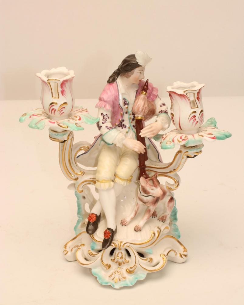 A DERBY PORCELAIN FIGURAL TWO BRANCH CANDELABRUM, c.1770, modelled as young piping shepherd