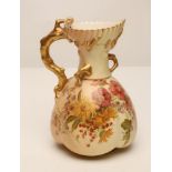 A ROYAL WORCESTER CHINA JUG, 1903, of lobed form with coral twig handle, painted in polychrome