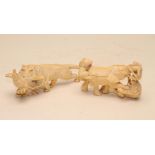 TWO JAPANESE ONE PIECE IVORY MODELS, early 20th century, one carved as a tiger catching a rooster in