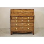 A GEORGIAN MAHOGANY BUREAU, c.1800, crossbanded with stringing, the fallfront enclosing fitted