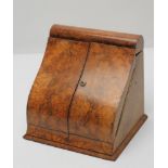 A VICTORIAN BURR WALNUT FOLDING STATIONERY BOX of oblong form, the fascia of sloping ogee outline,