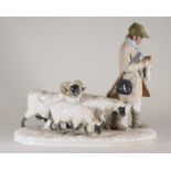 A MEISSEN PORCELAIN FIGURE GROUP, early 20th century, modelled by Otto Pilz as a shepherd knitting a
