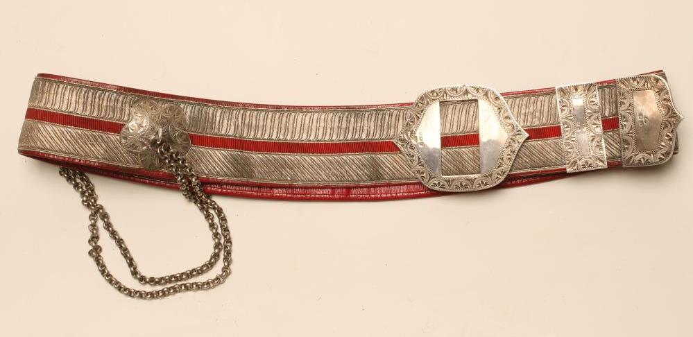 A YEOMANRY CAVALRY OFFICER'S CROSS-BELT, dated 1901, the red morocco belt with silvered embroidery