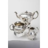 AN EARLY VICTORIAN SILVER THREE PIECE TEA SET, makers The Barnards, London 1841, of rounded