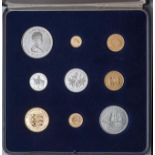 A BAILIWICK OF JERSEY ELIZABETH II SILVER WEDDING COIN SET, 1972, comprising 22ct gold £50, £25, £