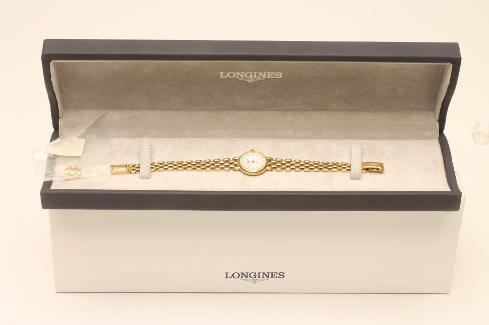 A LADY'S LONGINES 18CT GOLD WRISTWATCH, the circular white dial inset with diamond "dot" markers - Image 3 of 3