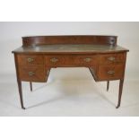 AN UNUSUAL GEORGIAN MAHOGANY FOLDING WRITING TABLE, c.1800, the oblong reeded edged folding top