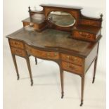 A LADY'S EDWARDIAN MAHOGANY DESK, crossbanded with stringing and marquetry foliage and swags, the
