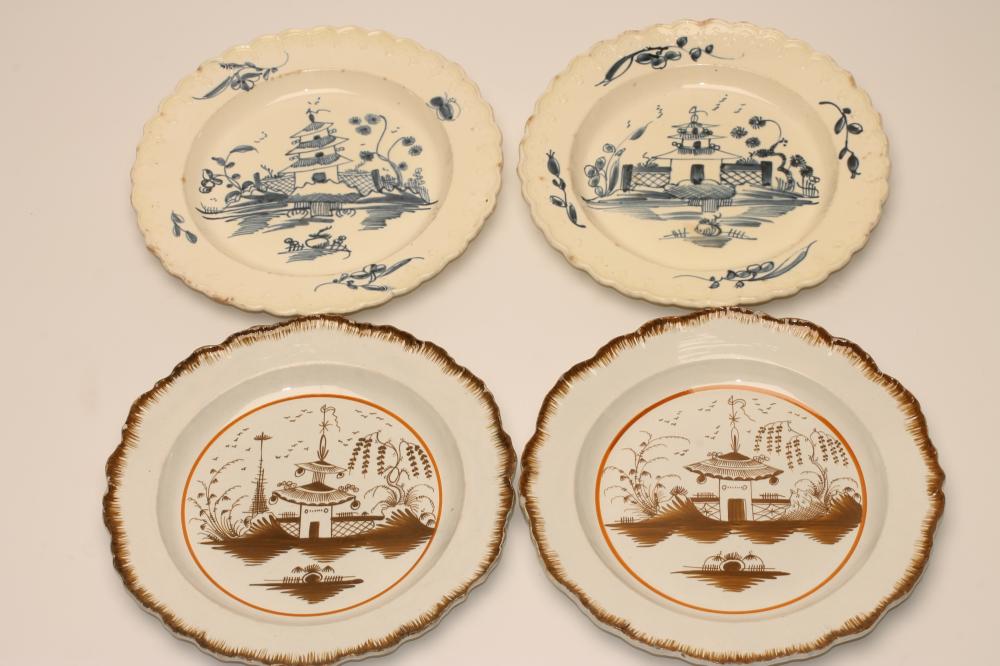 A PAIR OF YORKSHIRE PEARLWARE PLATES, c.1800, of shaped circular form with brown highlighted feuille