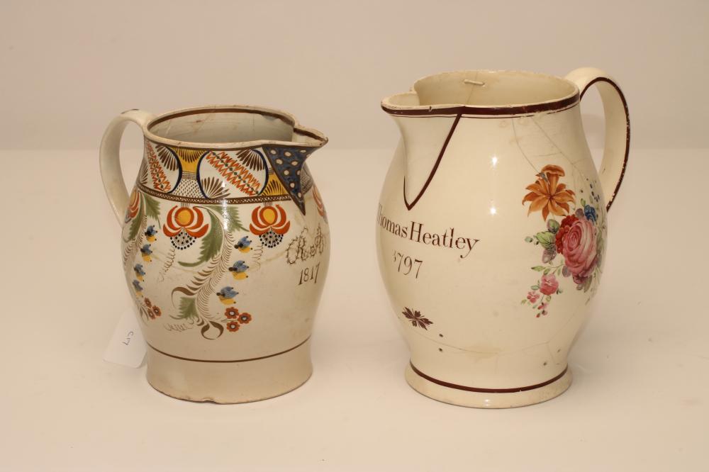 TWO ENGLISH DOCUMENTARY JUGS, 1797 and 1817, comprising a creamware example of baluster form with