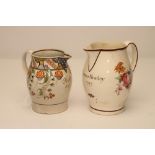 TWO ENGLISH DOCUMENTARY JUGS, 1797 and 1817, comprising a creamware example of baluster form with