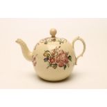 A CREAMWARE TEAPOT AND COVER, late 18th century, of globular form with feather incised double "C"
