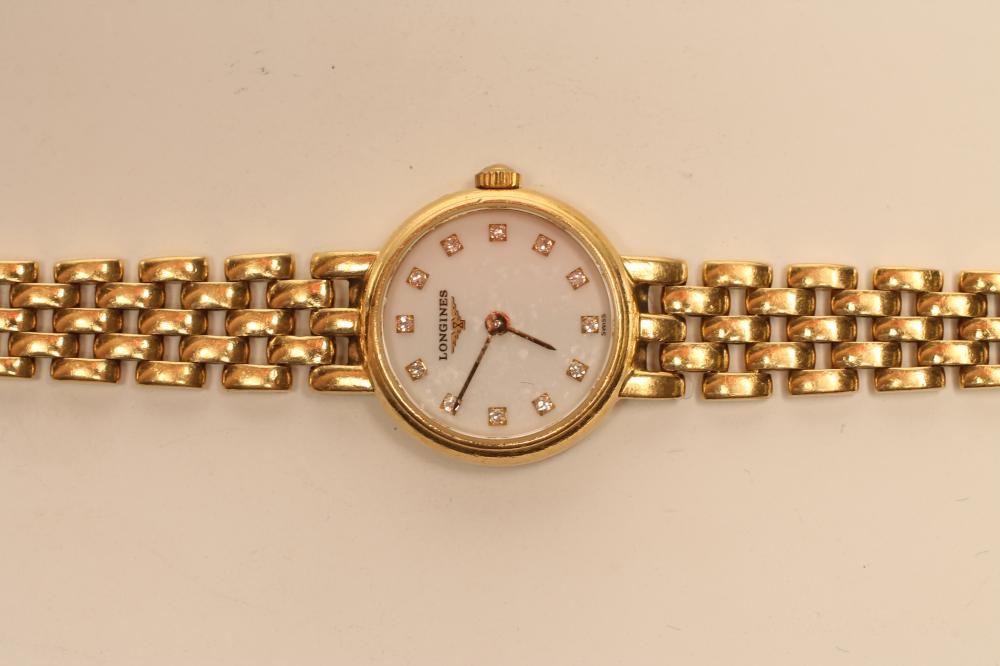 A LADY'S LONGINES 18CT GOLD WRISTWATCH, the circular white dial inset with diamond "dot" markers - Image 2 of 3