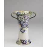 A MACINTYRE MOORCROFT POTTERY VASE, 1911-1913, of waisted cylindrical form with two loop handles,