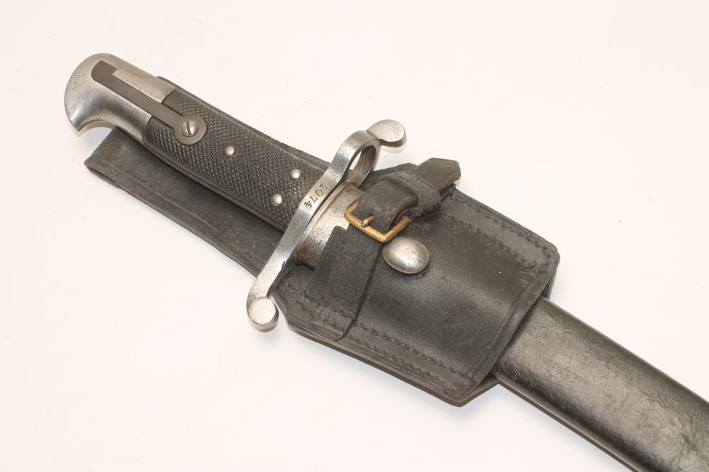 A BRITISH 1860 PATTERN BAYONET, with 22 3/4" fullered blade, cross guard stamped 2074, chequered