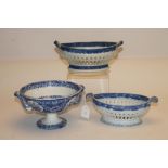 TWO PEARLWARE CHESTNUT BASKETS, c.1790, of two handled oval form, both centrally printed in