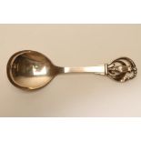 A DANISH SILVER SERVING SPOON, assayer Johannes Siggaard, maker's mark indistinct, 1944, with cast