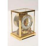 A GILT BRASS CASED JAEGER LECOULTRE ATMOS CLOCK, model No. Classic V, Movement 265928, guarantee