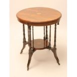 A VICTORIAN ROSEWOOD OCCASIONAL TABLE of circular form with stringing and marquetry batwing