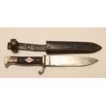 A HITLER YOUTH DAGGER, with 5 1/2" blade ricasso stamped RZM M7/31, the hilt with chequered two