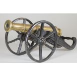 A SIGNAL CANNON, 19th century, the 12 1/4" barrel with ring moulded muzzle, simple trunnions,