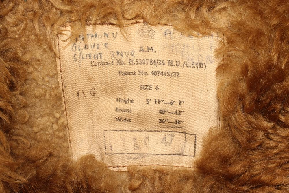 A SECOND WORLD WAR LEATHER FLYING JACKET, with sheepskin lining, waist strap and interior label, - Image 2 of 2