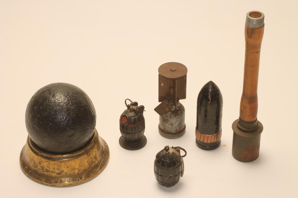 A COLLECTION OF WORLD WAR TWO EPHEMERA, comprising two British deactivated grenades, a deactivated