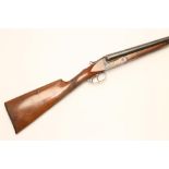 A 12 BORE EIBAR "PIONEER" SIDE BY SIDE SHOTGUN, with 27 1/2" sighted barrel, blued box-lock action