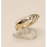 A FIVE STONE DIAMOND RING, the brilliant cut stones bar set to a plain 18ct gold shank, size N