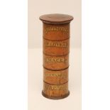 A SOFTWOOD SPICE TOWER, early 19th century, of five sections with applied printed labels Pepper,