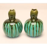 A PAIR OF BURMANTOFTS "FAIENCE" VASES, c.1900, of globular form with "pushed in" panels and