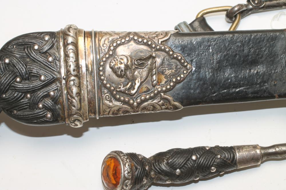 A SCOTTISH DIRK, 19th century, the fullered blade with serrated back edge, shaped wood grip - Image 3 of 5