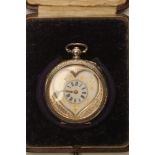 A LADY'S SILVER CASED KEY WIND FOB WATCH, the heart shaped white enamel dial with black Roman