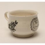 A PEARLWARE MINIATURE CHAMBER POT, c.1810, of baluster form with plain handle, printed in underglaze