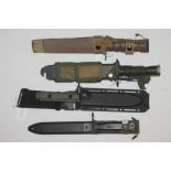 A US STRIDER BAYONET FOR THE M9, in plastic scabbard, together with a Taiwanese M9 bayonet, a US OKC