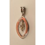 A DIAMOND PENDANT, the marquise cut stone pendant in an eliptical open panel gypsy set with six