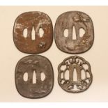 THREE JAPANESE IRON TSUBA, all with inlaid decoration, one depicting a dragon fly, another depicting