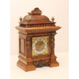 A GERMAN WALNUT CASED MANTEL CLOCK, c.1900, the two train movement stamped RSM, No.584323, and
