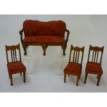 A suite of dolls' furniture in hardwood upholstered in red brocade, comprising settee, 9" wide,