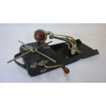 A Peter Pan "camera" gramophone with folding black leather cloth covered wood case, wind up motor,